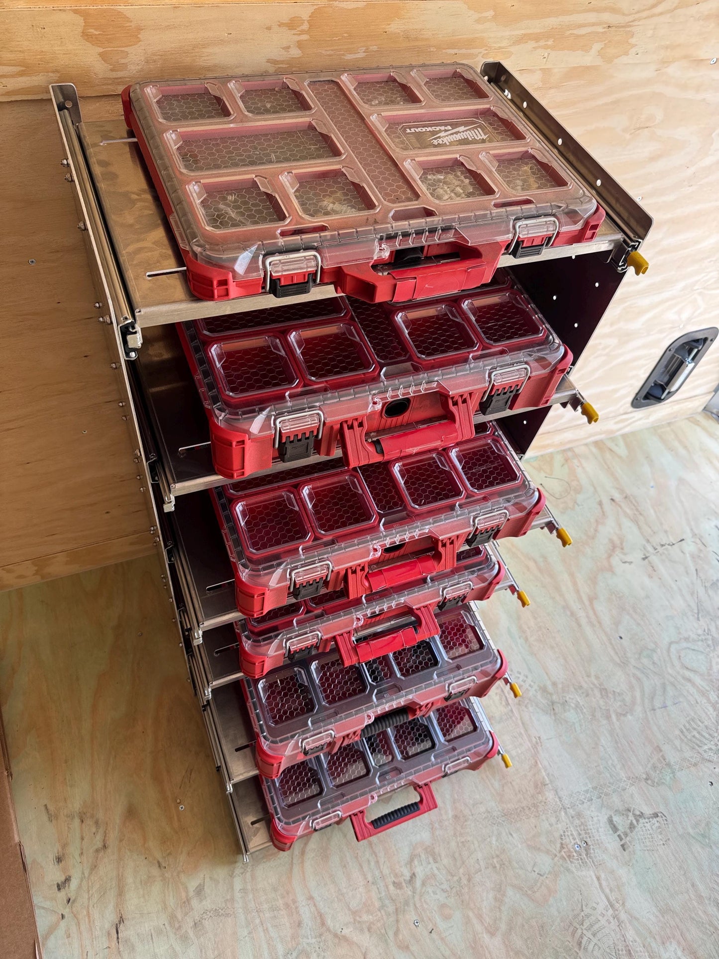 The Slider. Draw slider. Locking.   Milwaukee packout shelf rack system full size tool box, railing version