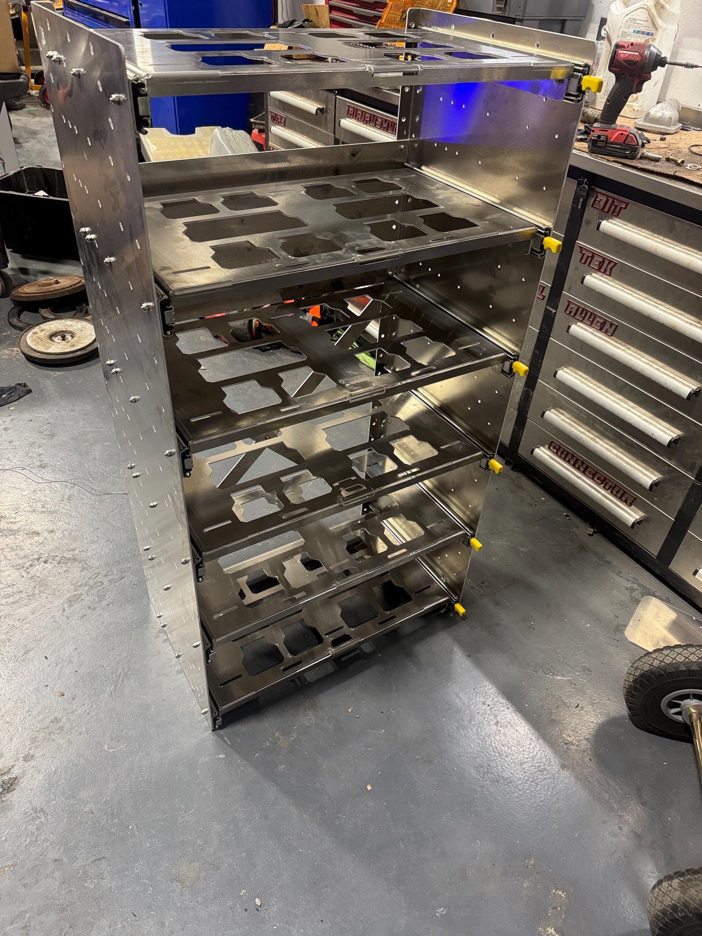 The Slider. Draw slider. Locking.   Milwaukee packout shelf rack system full size tool box, railing version