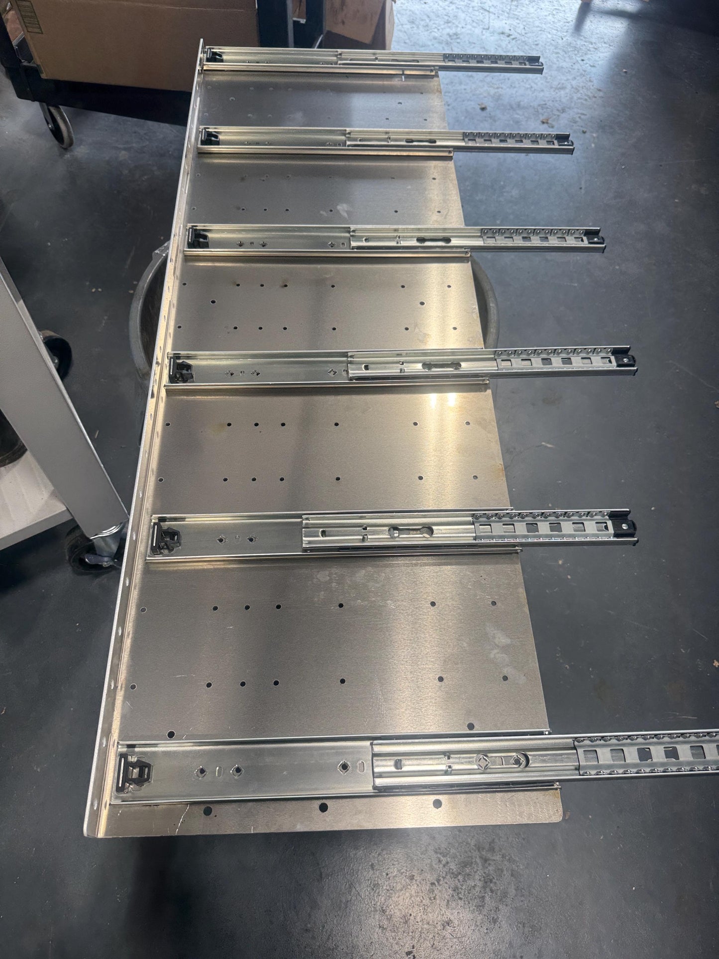 The Slider. Draw slider. Locking.   Milwaukee packout shelf rack system full size tool box, railing version